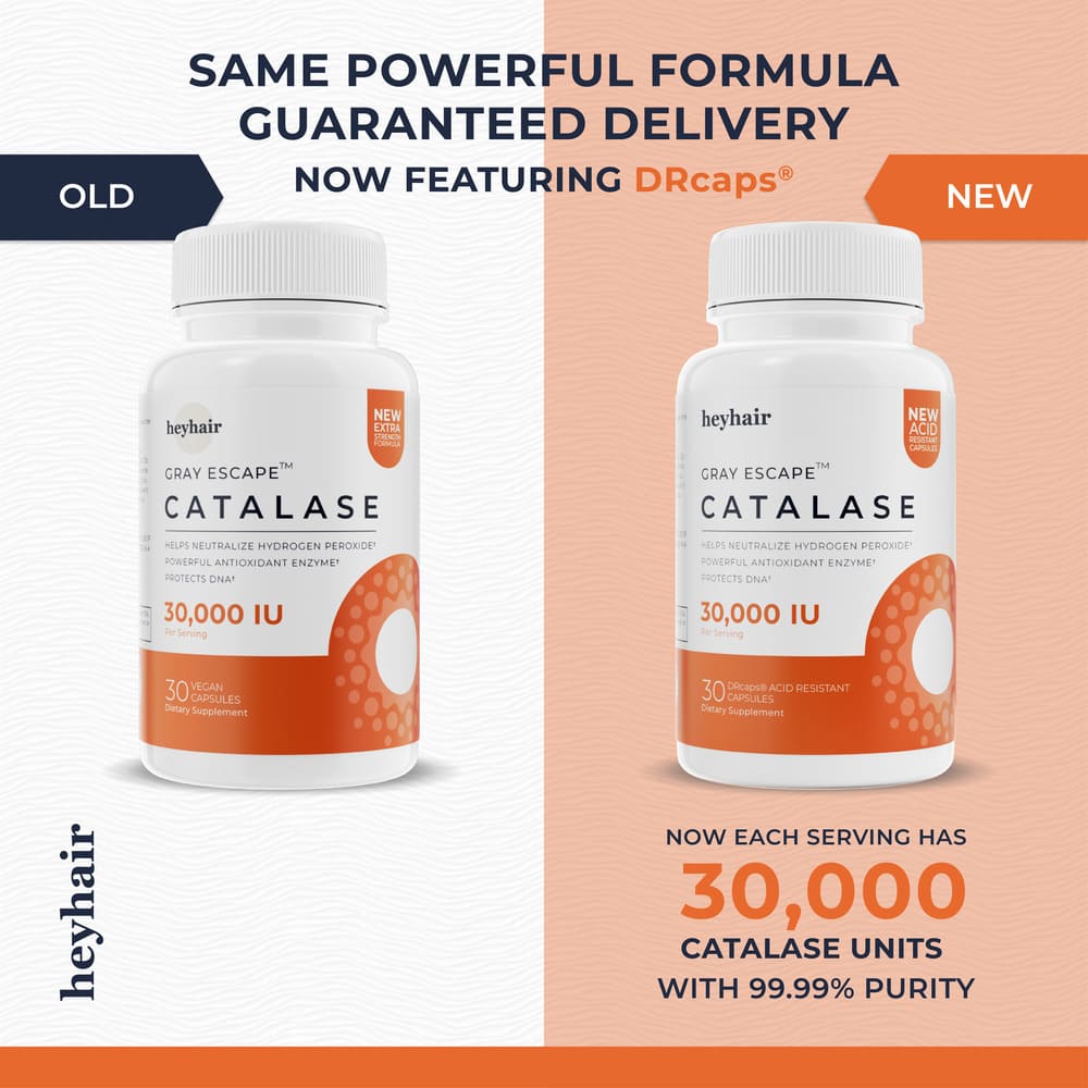 Man smiling and holding a supplement bottle while taking a pill.