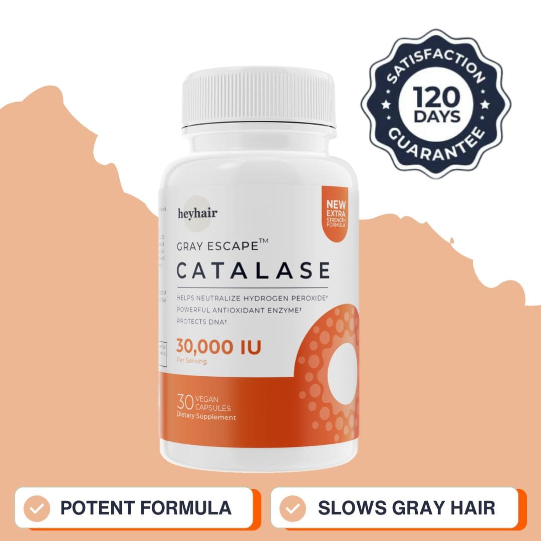 Man smiling and holding a supplement bottle while taking a pill.